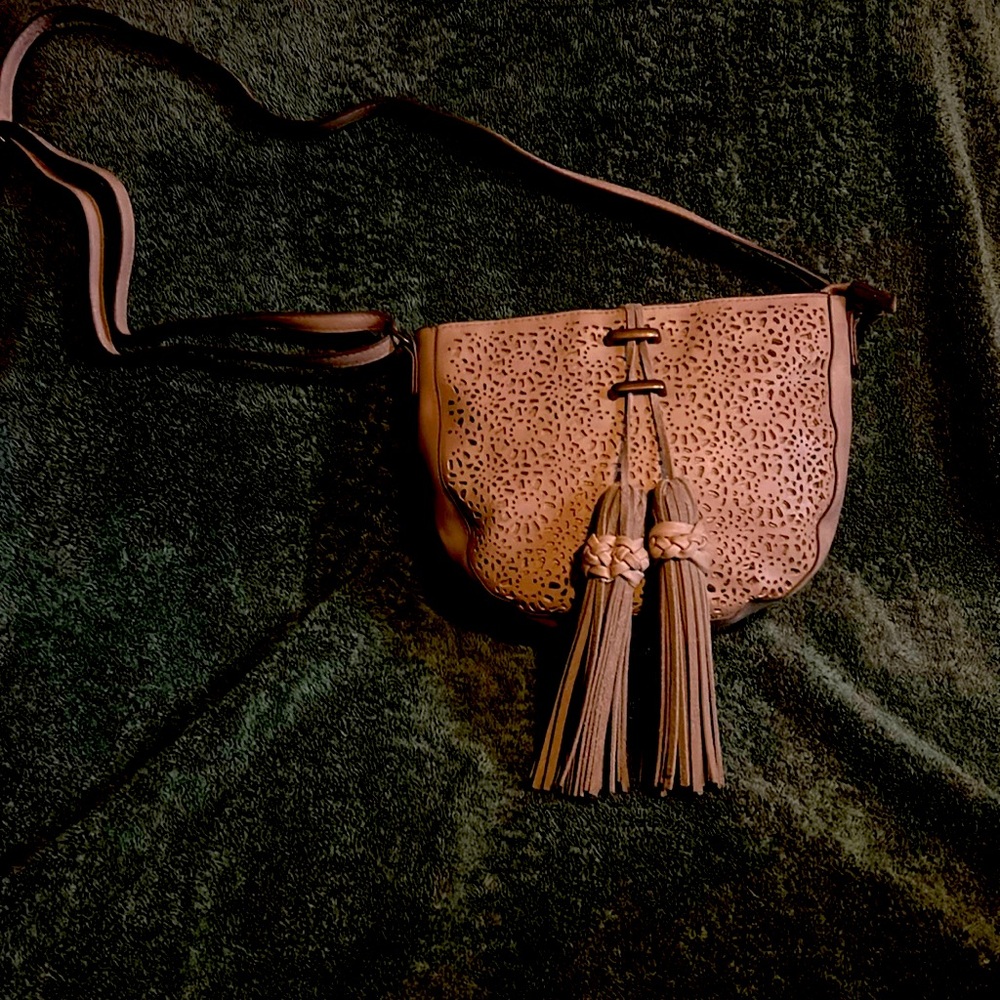 Tan T-shirt and jean co. Strap bag